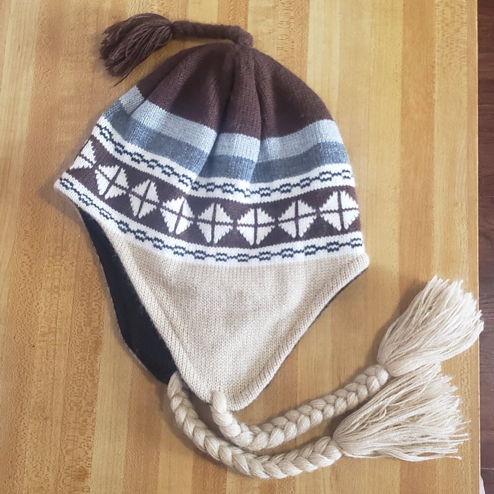Knit Hat with Braided Tassels